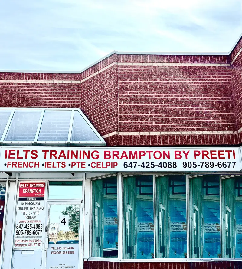 Signage for "IELTS Training Brampton by Preeti" offering language courses, featuring contact information and services listed.